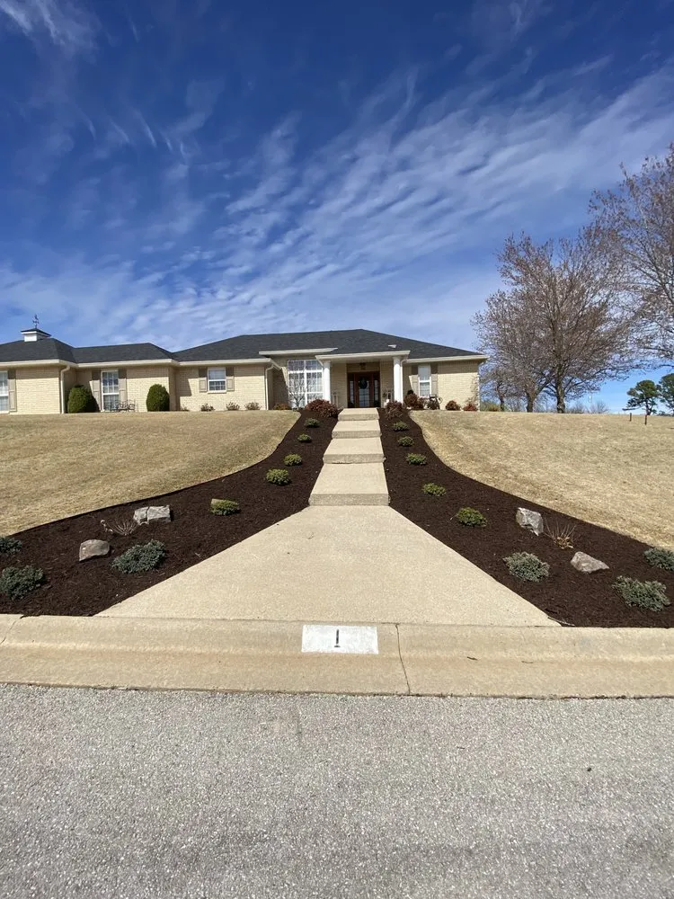 Top-rated yard maintenance with custom design in Bentonville, AR by Bed Revival Landscaping