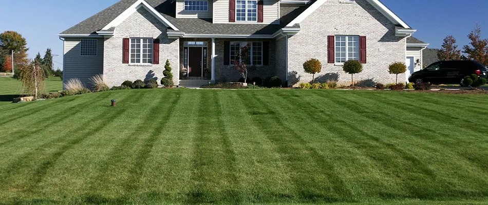 Custom outdoor landscaping in Painesville, OH by Bell Quarters Lawn Service