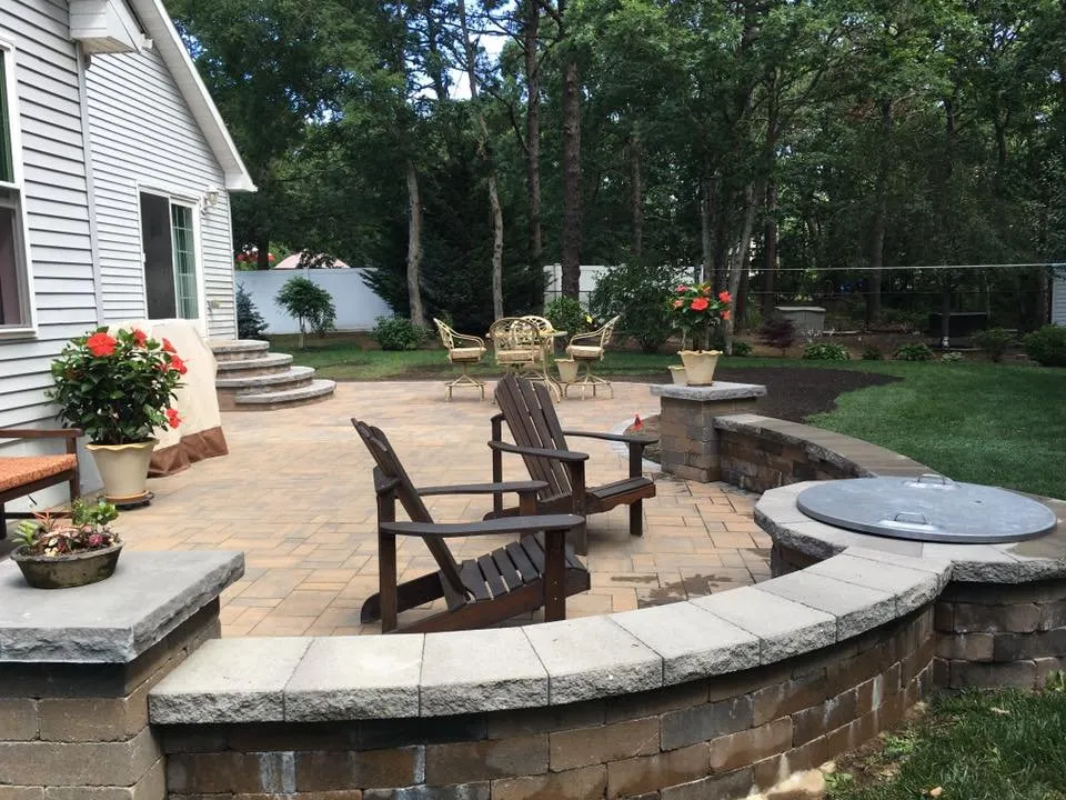 Custom lawn care service for beautiful yards in Coram, NY by Bella Fleur Landscape Design & Masonry