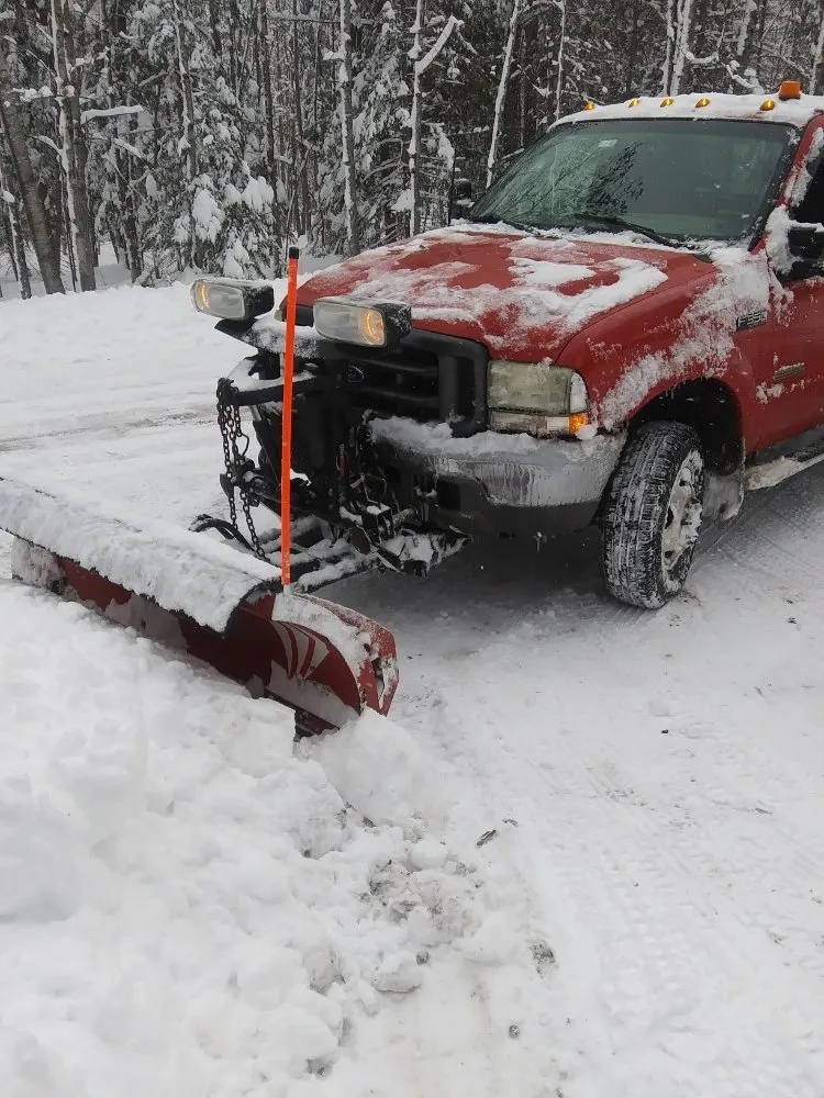 Expert lawn mowing service for year-round maintenance across Ironwood, MI - Bella Landscaping & Lawn Maintenance