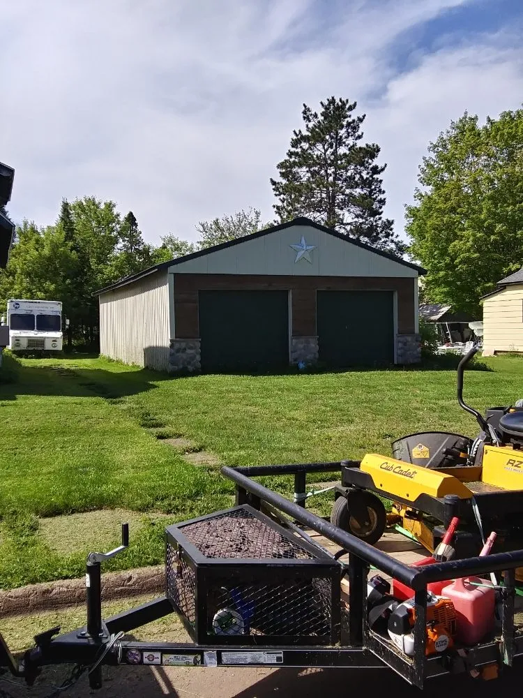 Reliable lawn mowing service for residential properties in Ironwood, MI by Bella Landscaping & Lawn Maintenance