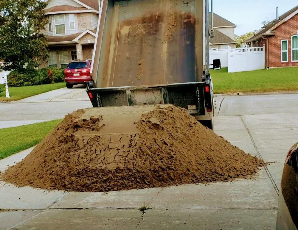 Expert lawn care service for homes in Slidell, LA by Bella Sand and Rock