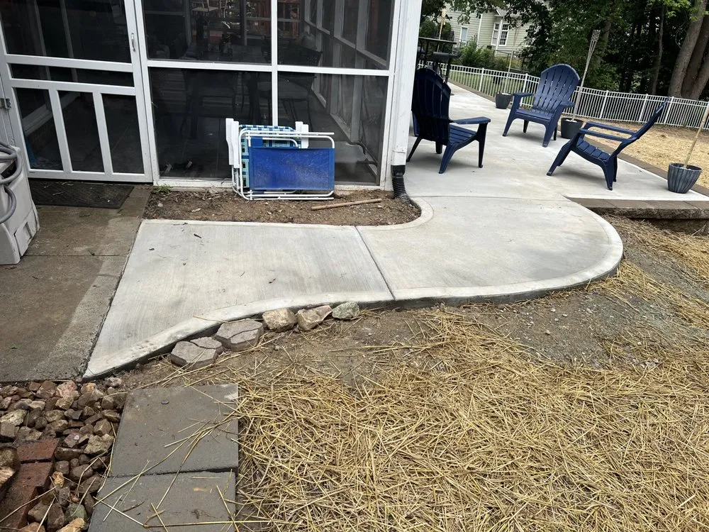 Custom lawn mowing service for year-round maintenance in Concord, NC by Bella Vista Construction, LLC