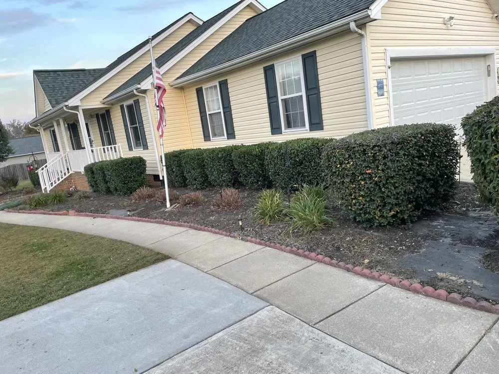 Reliable lawn mowing service for beautiful yards in Randleman, NC by Bella Vista Landscape