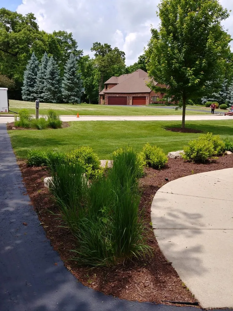 Expert landscaping services for residential properties in Janesville, WI by Bello Property Services