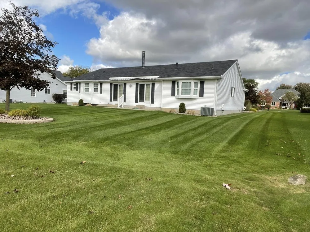 Custom lawn mowing service for year-round maintenance in Buffalo, NY by Belmont Landscape