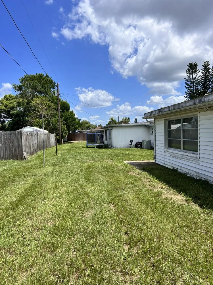 Custom landscape design for year-round maintenance across Holiday, FL - Beloved Lawns And Landscaping