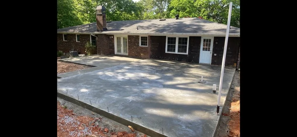 Custom landscape installation for residential properties in Cartersville, GA by Benchmark Builders