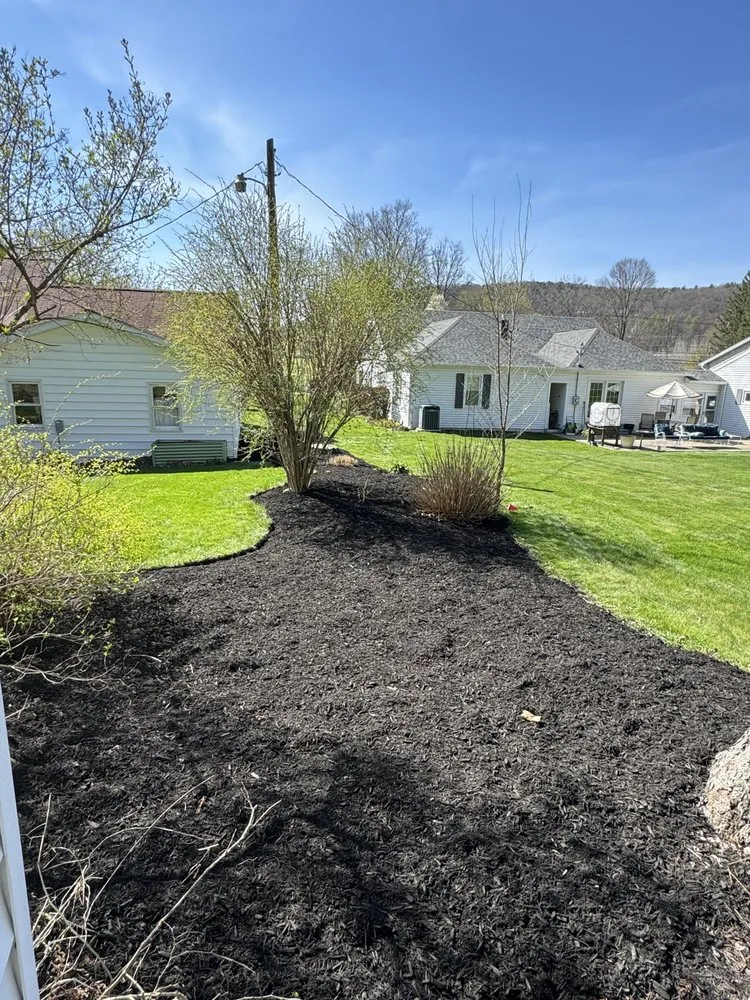 Custom landscape installation for residential properties in Penn Yan, NY by Benedict Landscaping