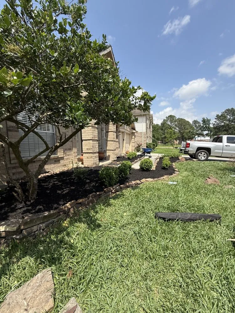 Custom garden landscaping for beautiful yards in Houston, TX by Benelli Complete Home Improvement