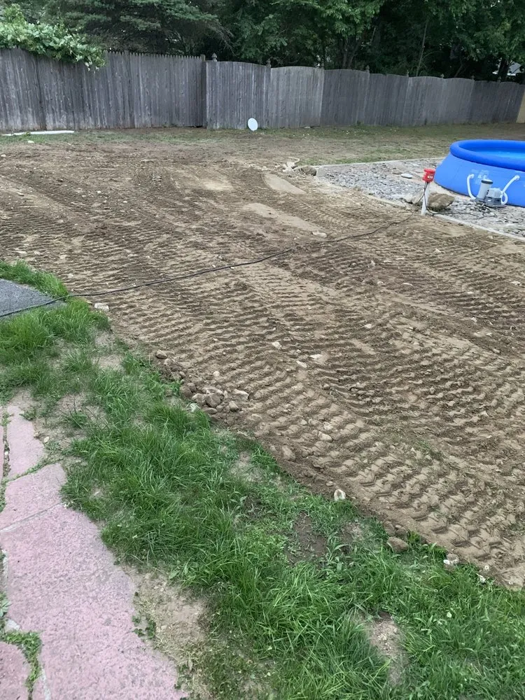 Affordable landscape installation with custom design in Westford, MA by Benfica Construction & Landscaping