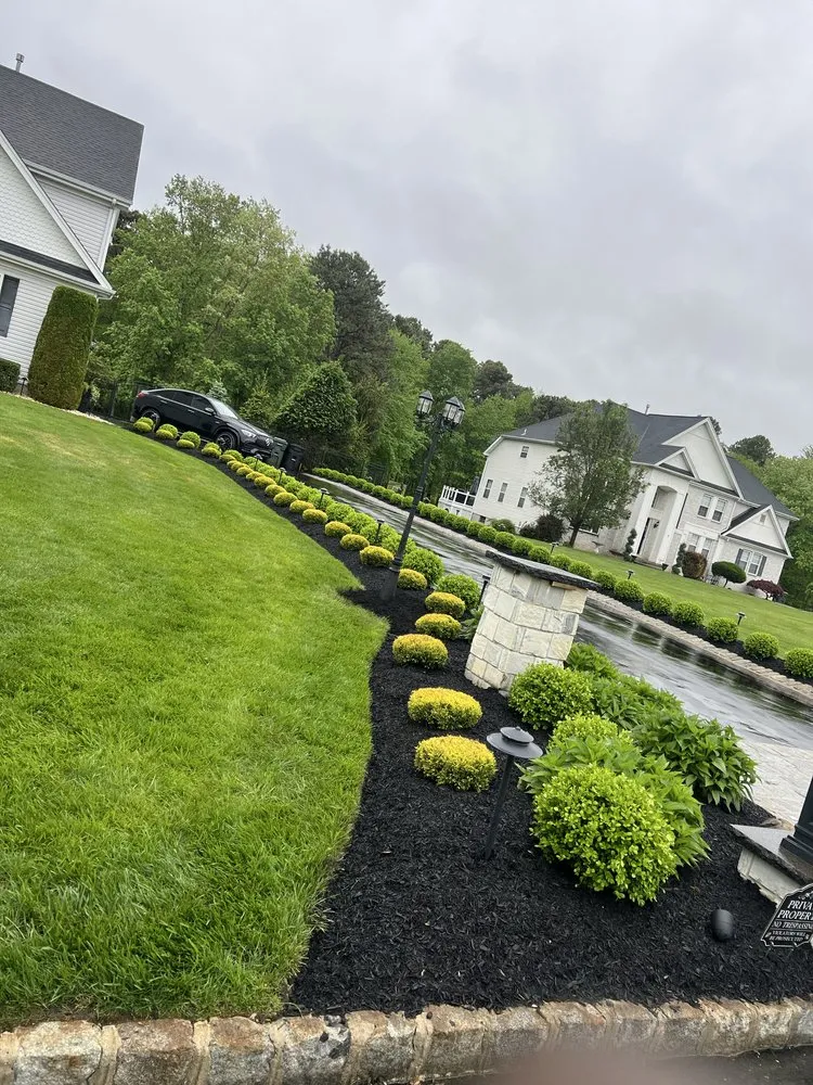 Custom landscape design for homes in Howell, NJ by Benites Landscaping