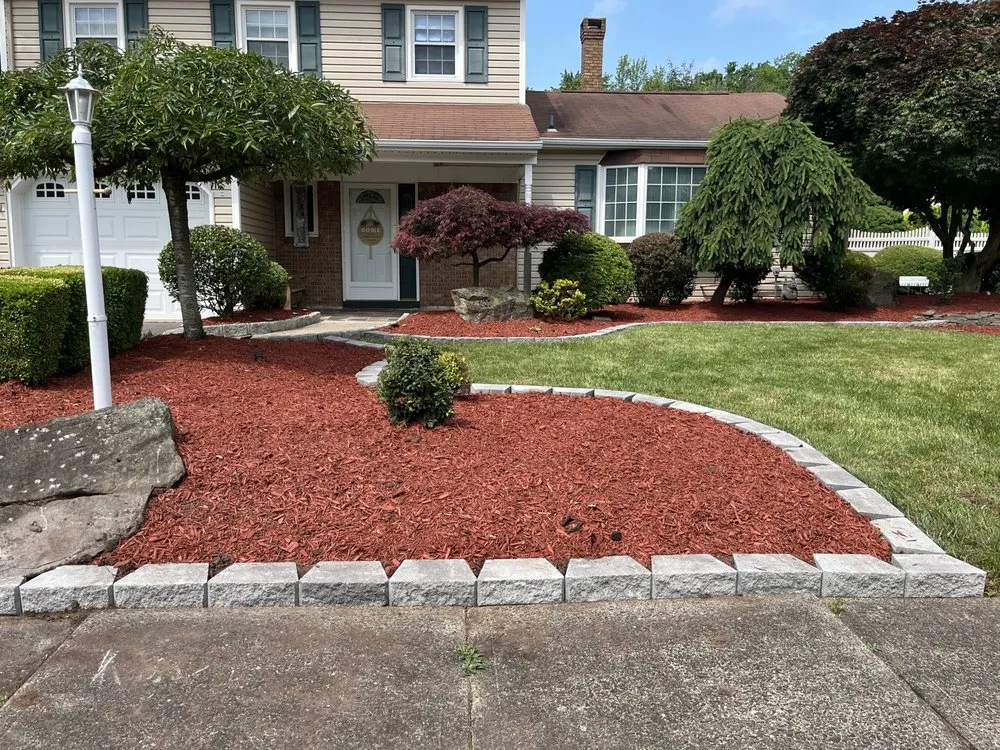 Custom outdoor landscaping with custom design across Howell, NJ - Benites Tree Service