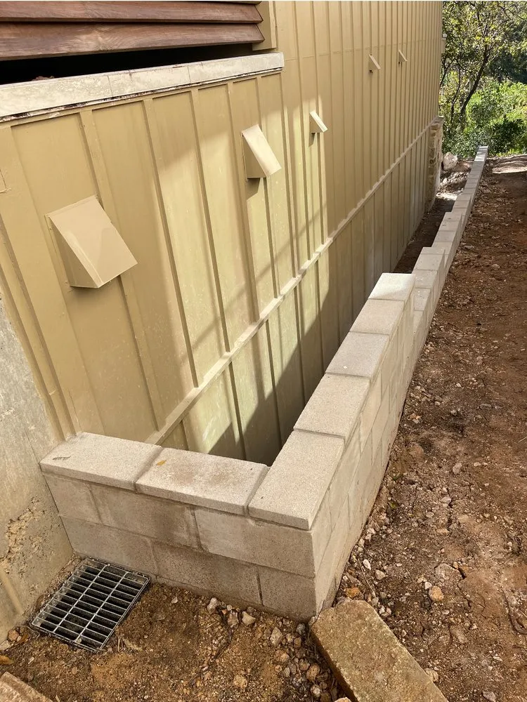 Affordable yard cleanup service in New Braunfels, TX by Benjamin's Concrete & Landscaping