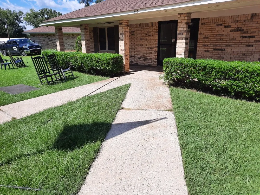 Affordable lawn mowing service for residential properties in Bossier City, LA by Benton Property Preservation