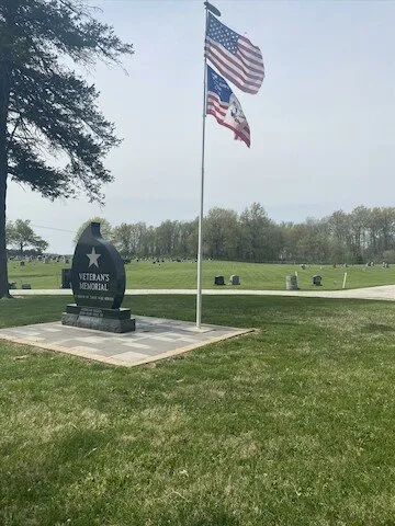 Local lawn mowing service with custom design in Morrisonville, IL by Bergschneider Landscaping