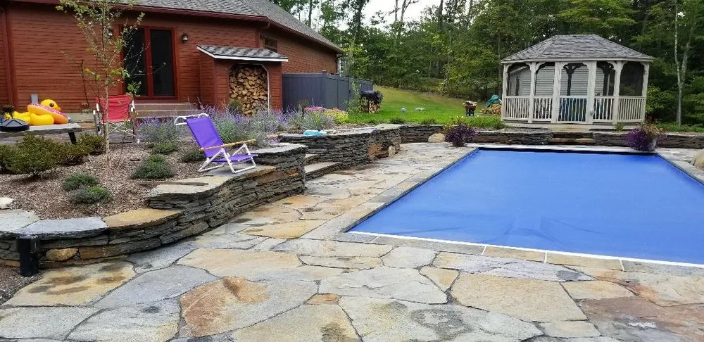 Top-rated lawn mowing service for year-round maintenance in Worthington, MA by Berkshire Stone Builders