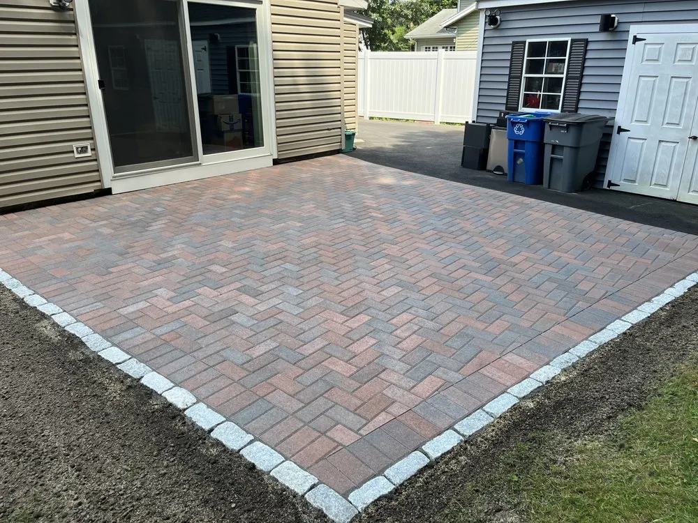 Professional lawn care service for residential properties across Peabody, MA - Berry Hardscapes