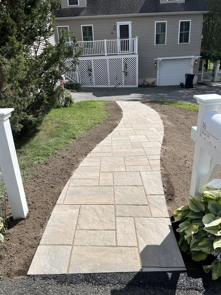 Professional yard cleanup service with custom design in Peabody, MA by Berry Hardscapes