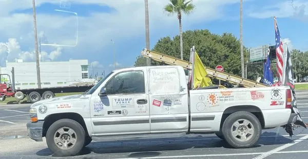 berserker patriot store lawn and trees Logo