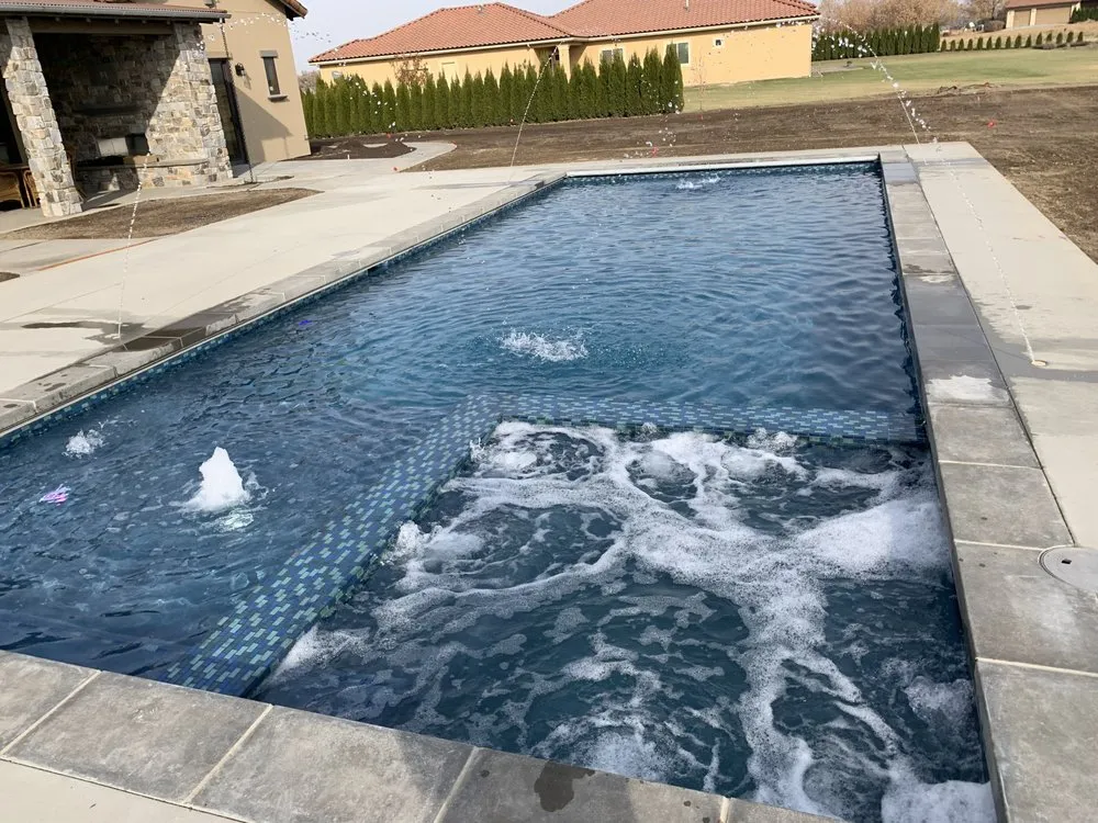 Custom lawn mowing service for outdoor upgrades in Kennewick, WA by Bertin’s pools and landscaping