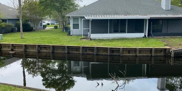 Expert lawn care service for homes across Jacksonville Beach, FL - Best Tree Service, Landscaping, Bulkheads and Docks