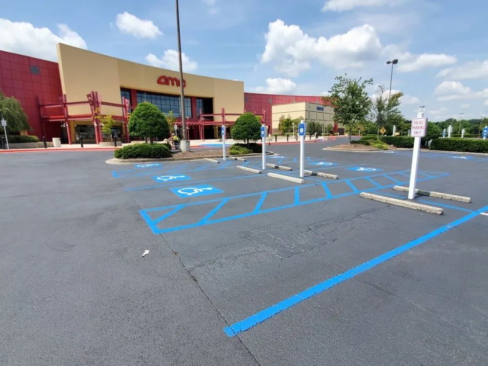 Top-rated lawn mowing service for residential properties in Acworth, GA by Between the Lines Parking Lot Renovations