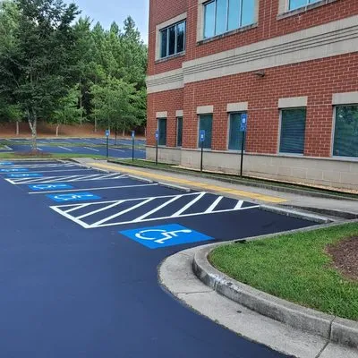 Between the Lines Parking Lot Renovations Logo