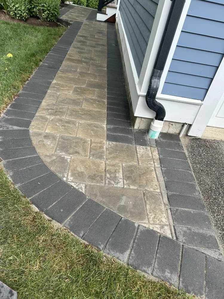 Affordable lawn mowing service in Waltham, MA by B&F construction and landscaping