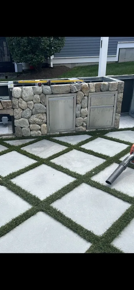 Affordable lawn mowing service with custom design across Waltham, MA - B&F construction and landscaping