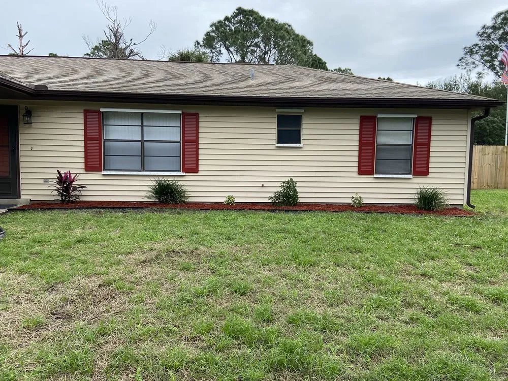 Professional lawn care service for homes in Palm Bay, FL by BG Landscaping