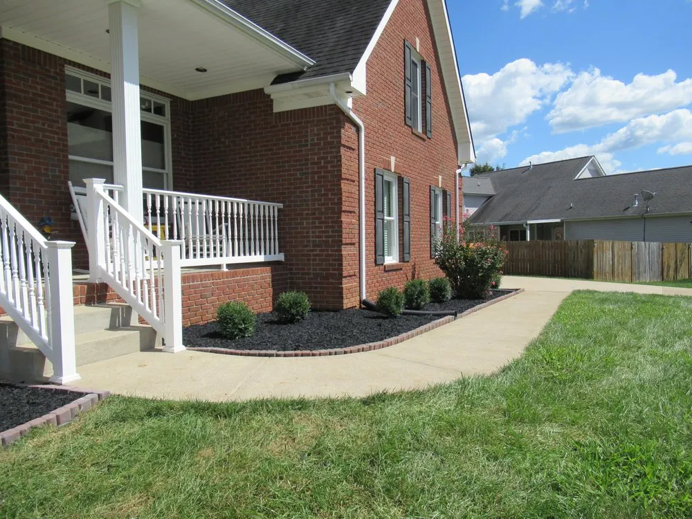 Expert lawn mowing service with custom design in Clarksville, TN by Bi-County Landscaping