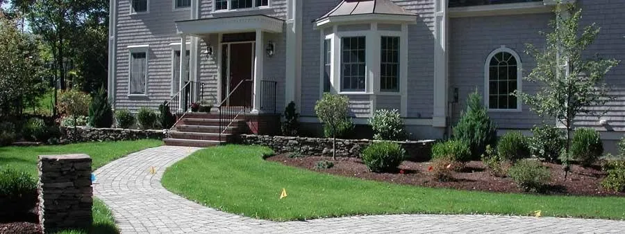 Custom landscape installation for residential properties in Cape Neddick, ME by Bibb Rock Landscaping