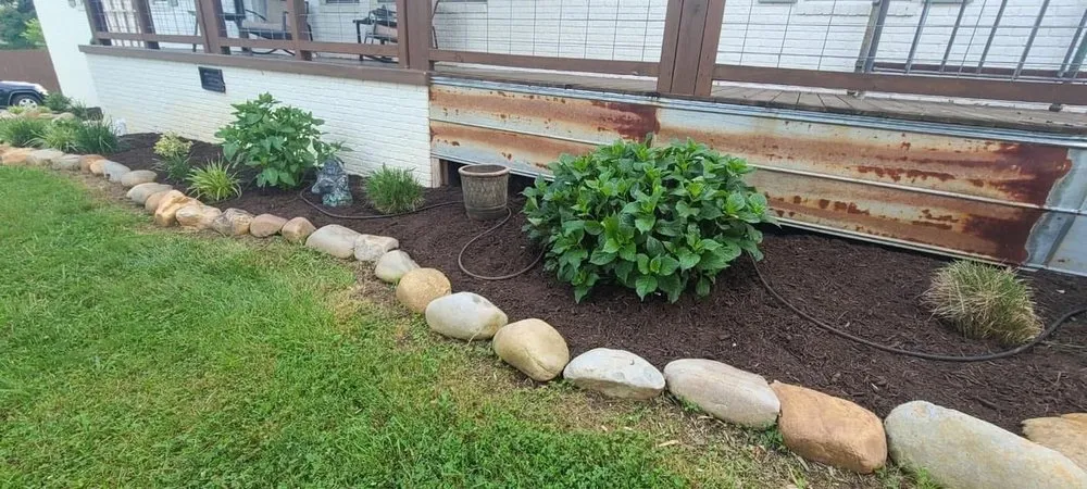 Professional lawn mowing service for outdoor upgrades in Sevierville, TN by Bice Landscape & Excavating