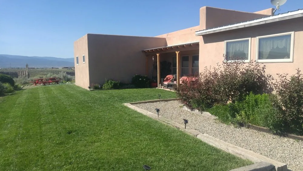 Custom landscaping services with custom design across Taos, NM - Big E Yard Care
