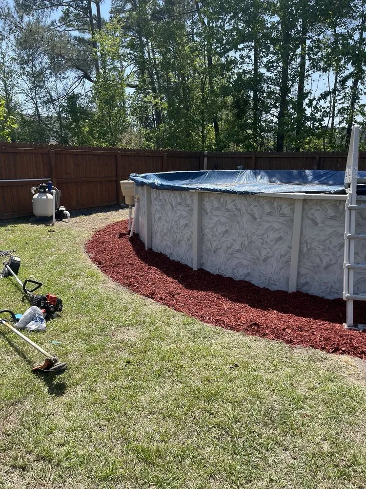 Expert lawn mowing service in Fayetteville, NC by Big Guy's Lawn Care