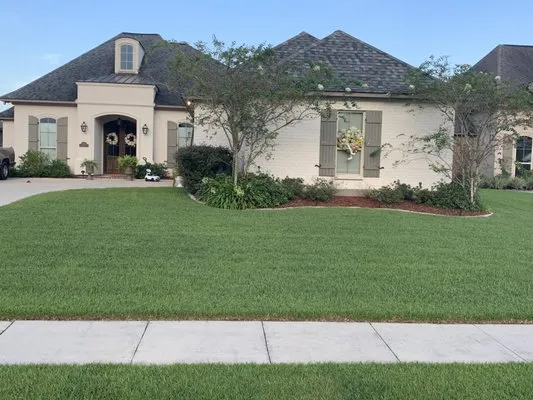 Big Lou's Grass Cutting and Landscaping Logo