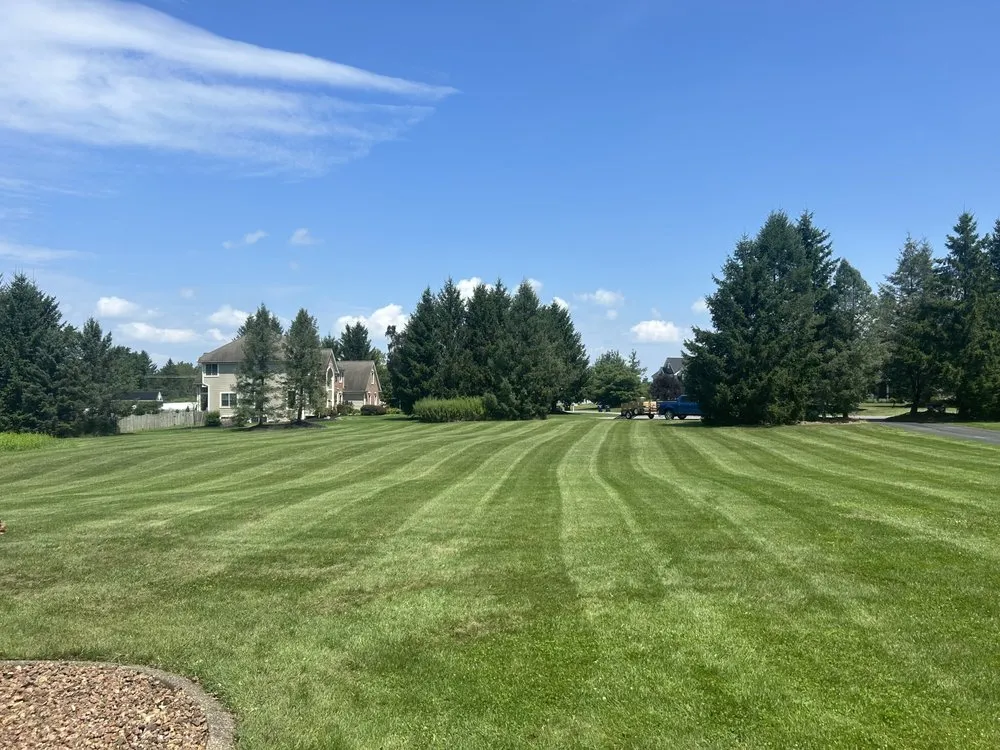 Local lawn mowing service for year-round maintenance across Fairport, NY - Big Moose Landscaping
