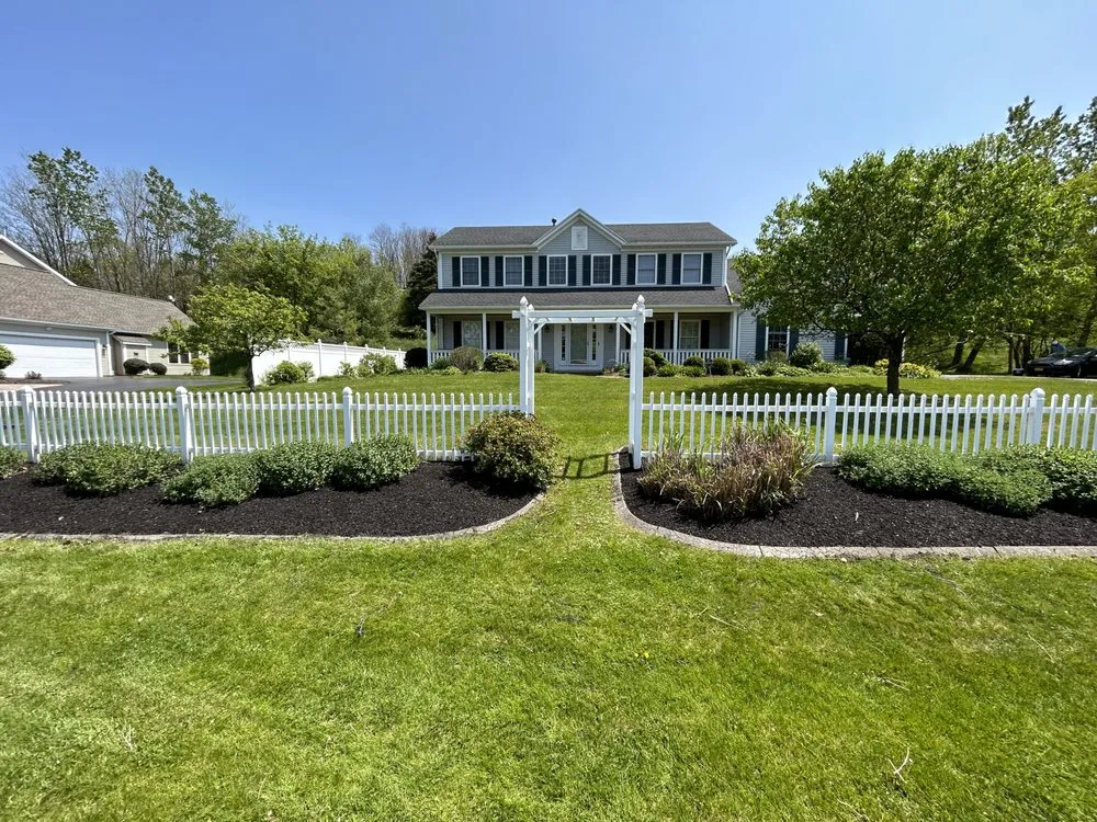 Custom outdoor landscaping for homes in Fairport, NY by Big Moose Landscaping