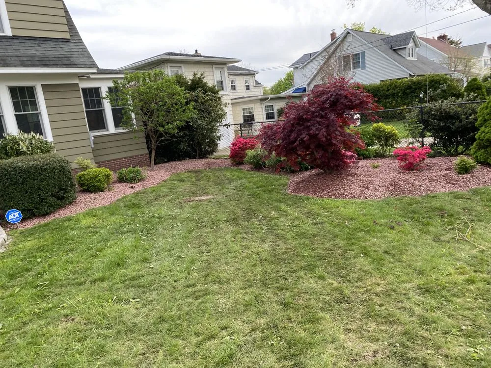 Custom landscape design for residential properties in Bayport, NY by Big Nick's Landscaping & Design