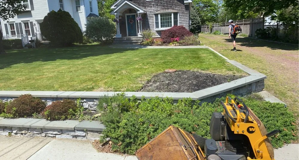 Affordable yard cleanup service for beautiful yards in Bayport, NY by Big Nick's Landscaping & Design