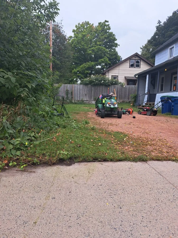 Top-rated yard cleanup service for homes in Wausau, WI by Bike Train Lawn Care
