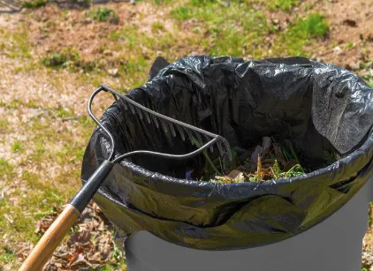 Custom yard cleanup service for residential properties in DeKalb, IL by Bill n' Sons Landscaping