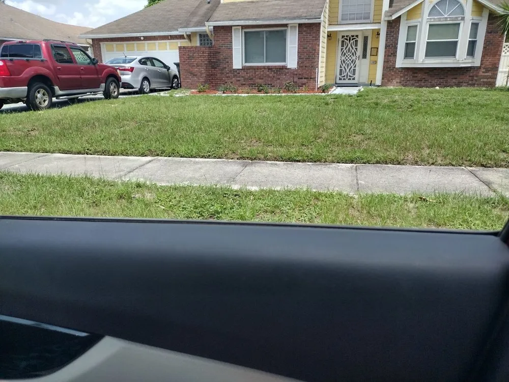 Professional yard cleanup service for outdoor upgrades in Ocoee, FL by Billy and Pam's Total Lawn Service