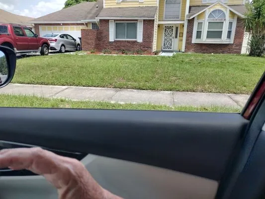 Billy and Pam's Total Lawn Service Logo