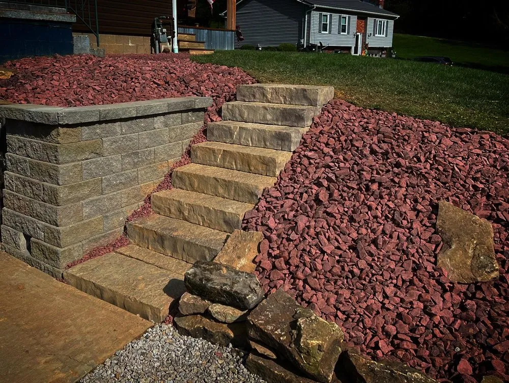 Professional outdoor landscaping for year-round maintenance in Lower Burrell, PA by Bird Dog Landscape Construction