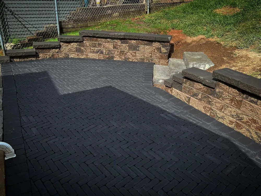 Custom landscape design with custom design in Lower Burrell, PA by Bird Dog Landscape Construction