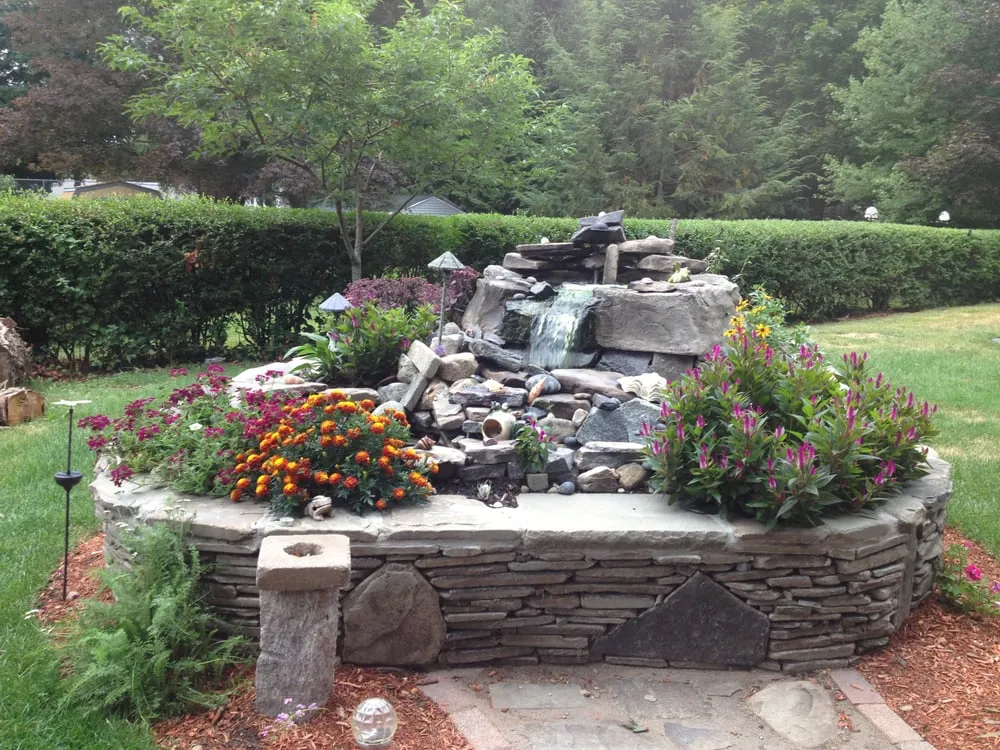 Top-rated lawn mowing service for year-round maintenance in Danvers, MA by Birmingham Landscape Construction