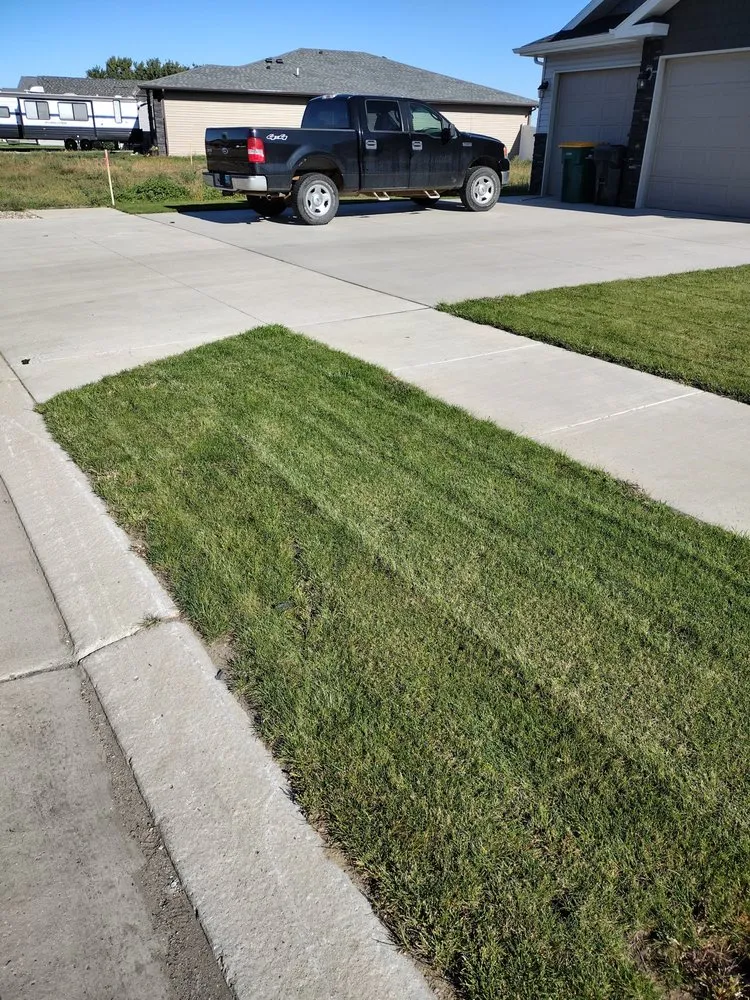 Affordable landscape installation for residential properties in Bismarck, ND by Bismarck Lawn Care