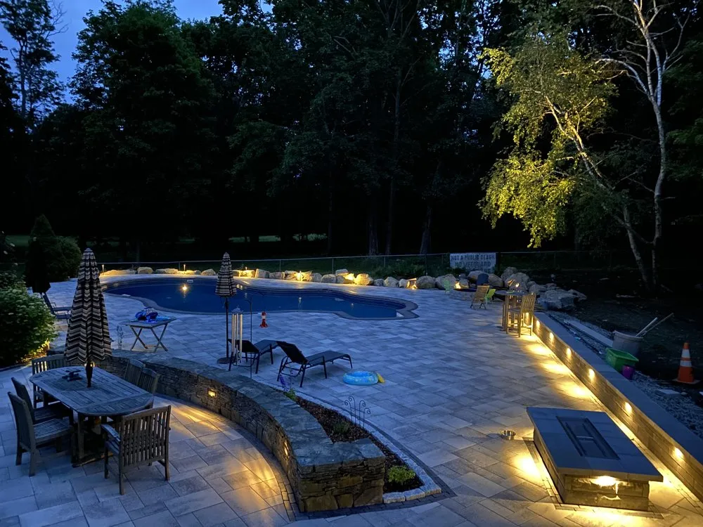 Professional lawn mowing service for year-round maintenance in Warwick, RI by BJK Landscaping & Construction